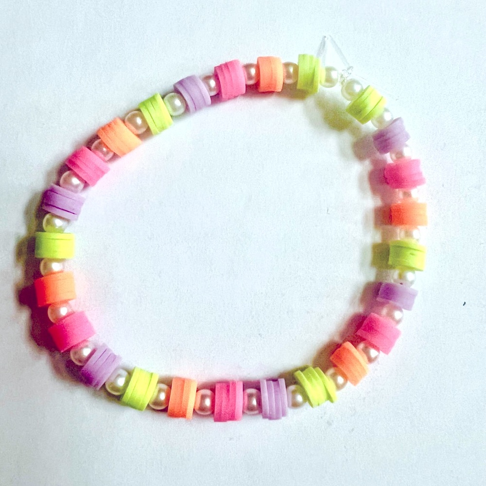 Hand made beaded bracelet, multi colored with pearl look accents